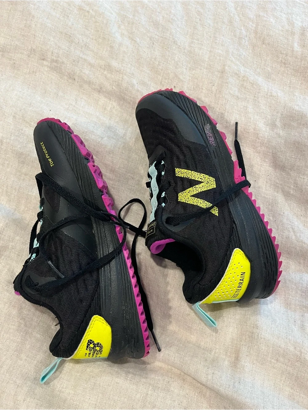 New Balance Women's Black Shoes with Yellow Heel and Pink Outsole